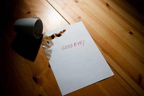goodbye note left behind by unknown, with unfinished spilled coffee.